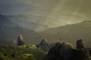 A rugged hilly landscape with rocky outcrops